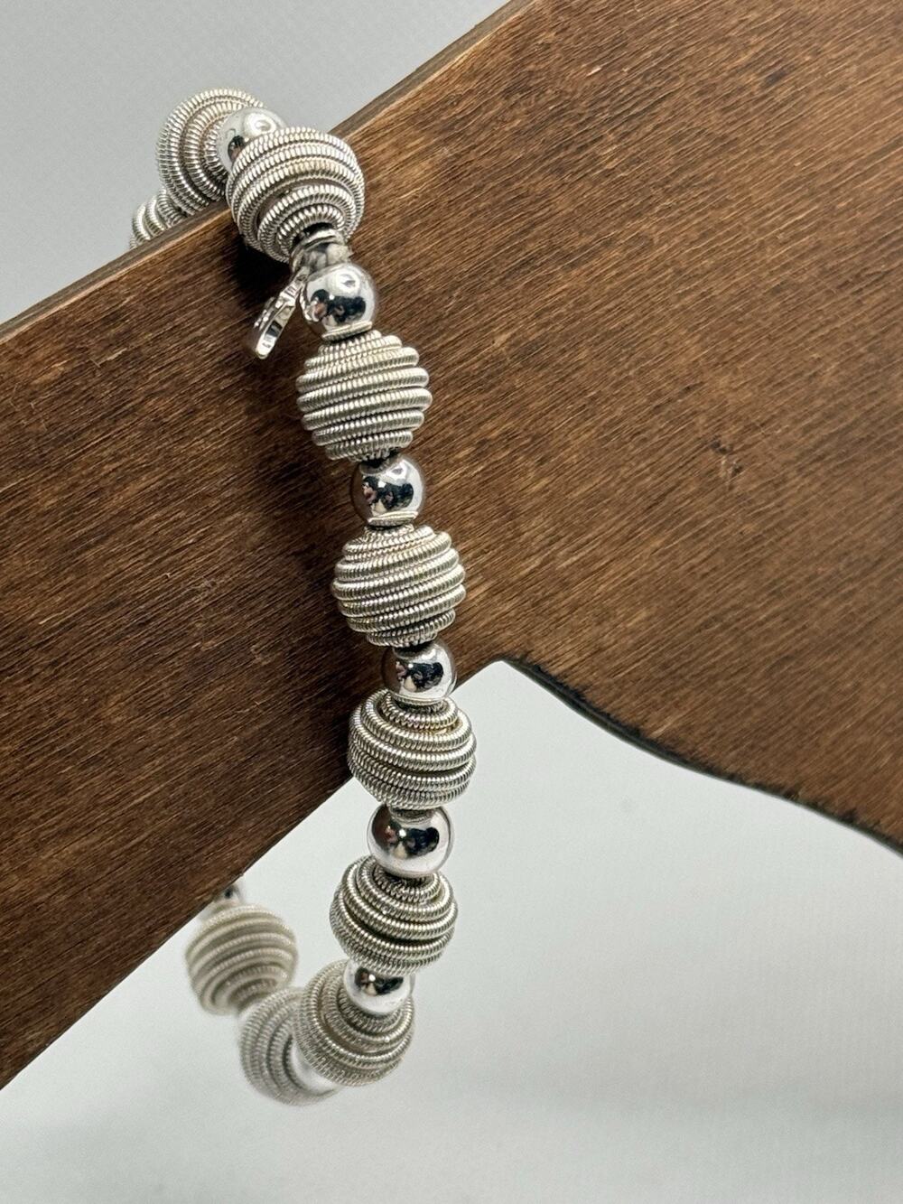 Vintage TRIFARI Silver Tone Coiled Wire Textured Bead Stretch Bracelet Crown Tag